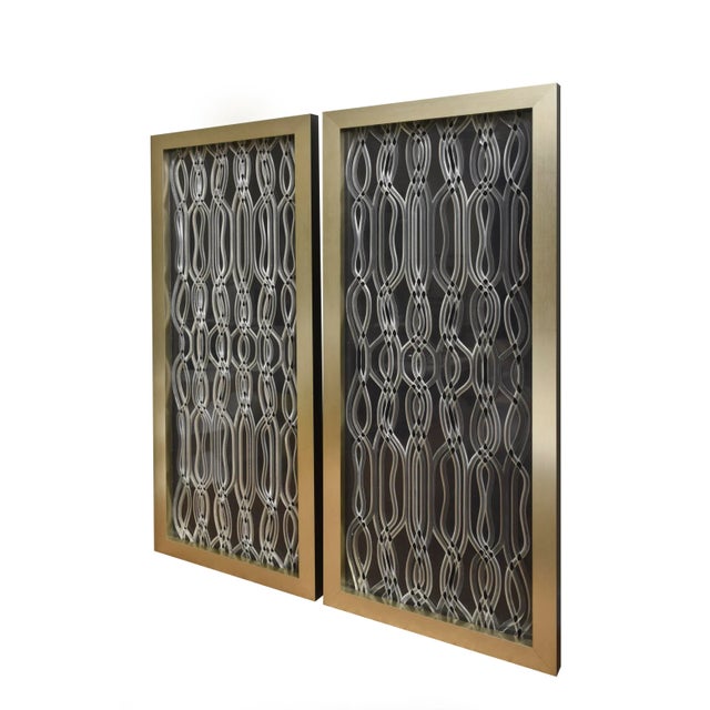 This pair of 1940's undulating lucite panels have been put in very custom frames with no plexi on the front. They are...