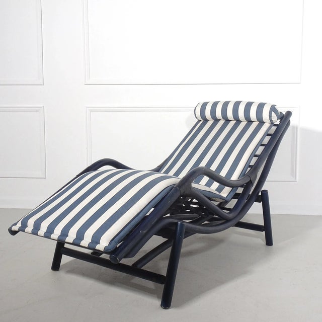 Fantastic bent bamboo lounger by Fletch Atelier Schütz. Leather wrapping. Lounger sits atop base. Bamboo with a navy blue...