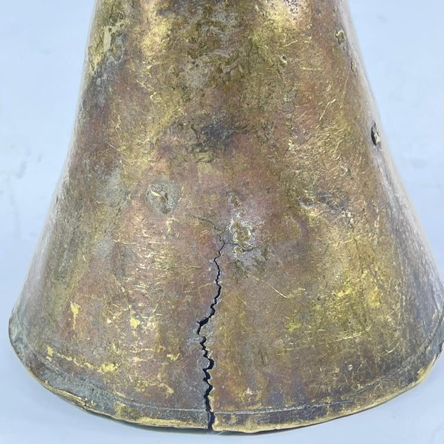 The brass metal bell was crafted by the Benue and Chamba artisans and metalworkers of Nigeria. These bells were often used...