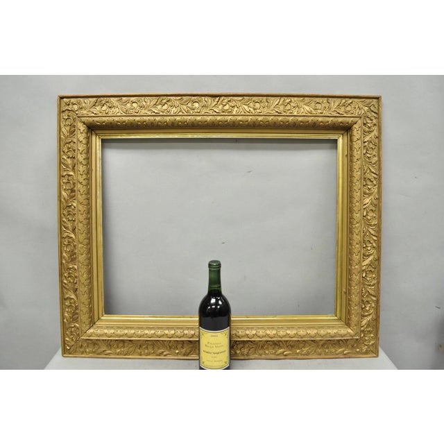 Antique Victorian Gold Gilt Oak Wood Leafy Scroll Deep Picture Frame. Circa Late 19th Century. Measurements: 32.5" H x...