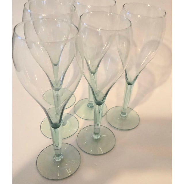 Are they goblets or flutes? It depends on what you need. Tall balloons in gorgeous sea glass green are ready for your table.