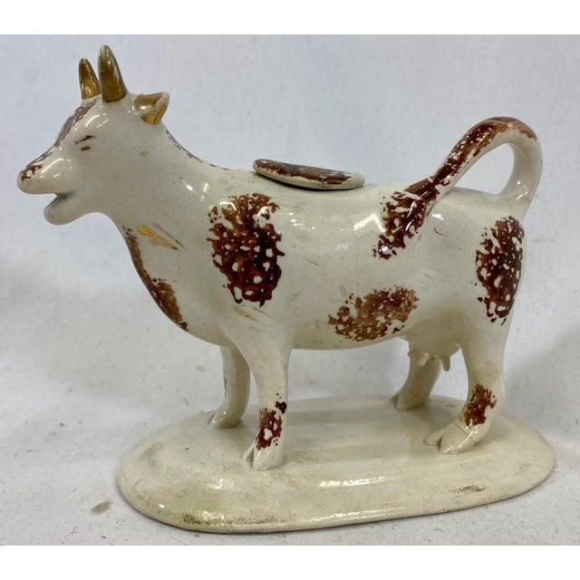 Antique Sponge-Ware Staffordshire Cow Creamer Figurine In Ivory Color Made in England - Circa 1860’s. Measures 6 1/8” W x...