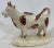 Antique Sponge-Ware Staffordshire Cow Creamer Figurine In Ivory Color Made in England - Circa 1860’s. Measures 6 1/8” W x...