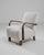 Enhance your living space with this sophisticated 1960s Czech Upholstered Armchair by the renowned Jindřich Halabala....
