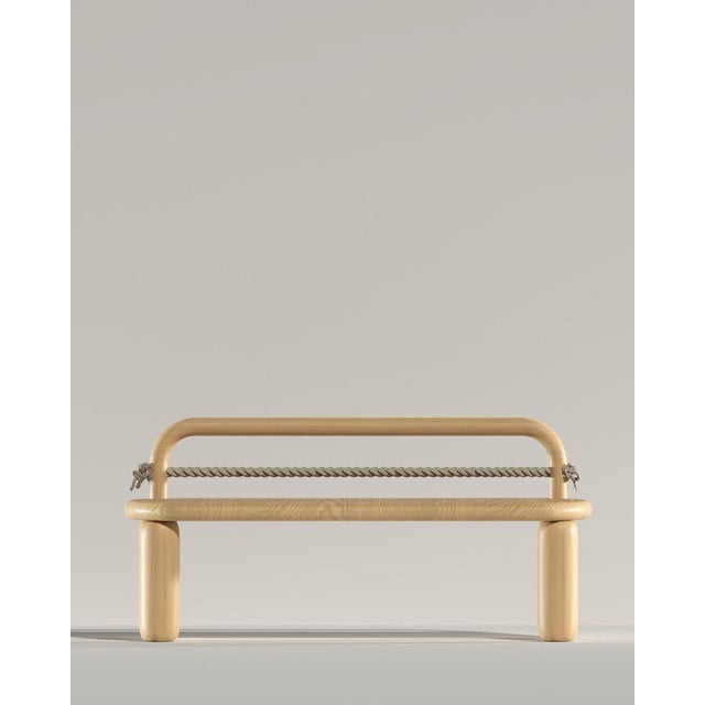 Rope bench in gentle natural oak by virginia arlotto dimensions: d 51 x w 150 x h 71 cm. Materials: natural oak and rope....