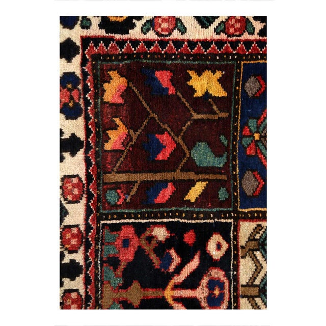 Offered is a gorgeous Antique Persian Bakhtiari area rug is a luxurious hand-knotted pile is made from very fine lamb's...