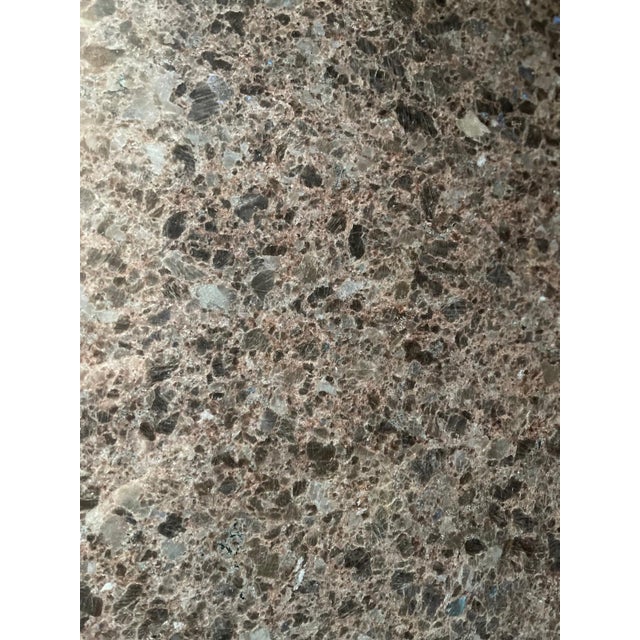 A contemporary pedestal table composed of a sculptural Abbott metal base by Bernhardt paired with a newly fabricated oval...