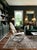 An elegant, high-back mid-century modern rocking chair heavily inspired by iconic Thonet bentwood designs. This piece...
