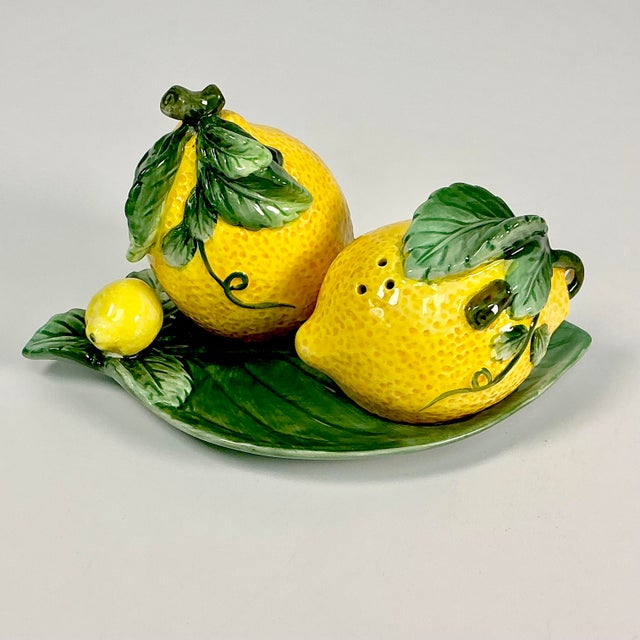 Vintage Home is pleased to offer this set of Majolica ceramic Lemon Salt & Pepper Shakers. The 3 piece set includes 2...