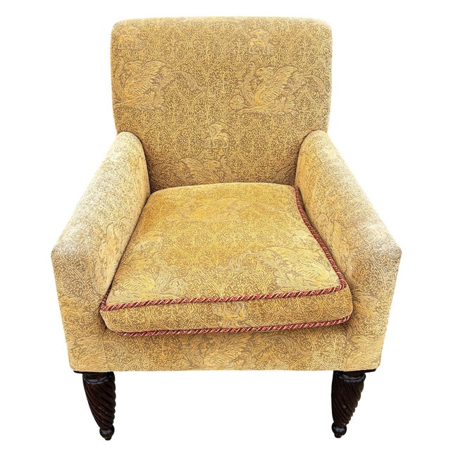 Late 20th century French saddle bag armchair lounge with yellow foliage pattern upholstery. This club armchair featuring a...