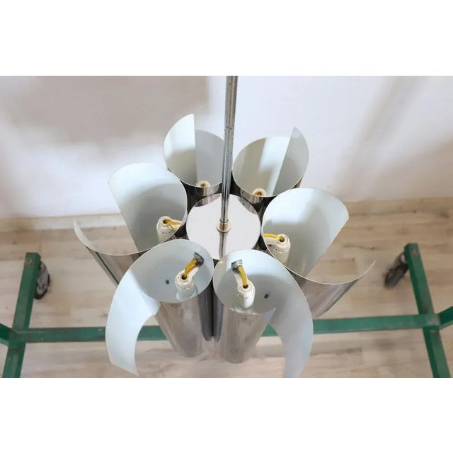 Beautiful Italian design of the period space age chandelier in stell with six bulbs, 1970s. Perfect conditions fully...