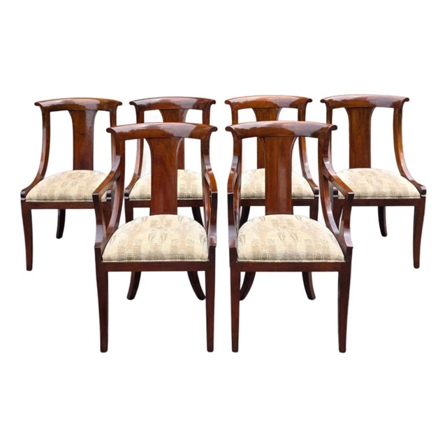 A refined set of six Stickley dining chairs inspired by the elegant Klismos form and the restrained sophistication of the...
