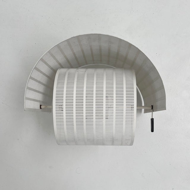 Shogun Wall Lamp by Mario Botta for Artemide, 1980s, in Good conditions. Designed 1980 to 1989 This piece has an...