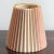 This petite mid-20th century lamp shade is very much "of the era" with its tall, elongated profile and earthy tones. This...