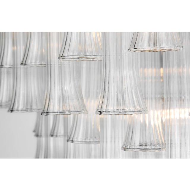 Lorelei X-Large Oval Chandelier in Gild with Clear Glass Designer: Julie Neill Canopy: 5.75" Round Mounting: Chain Shade...