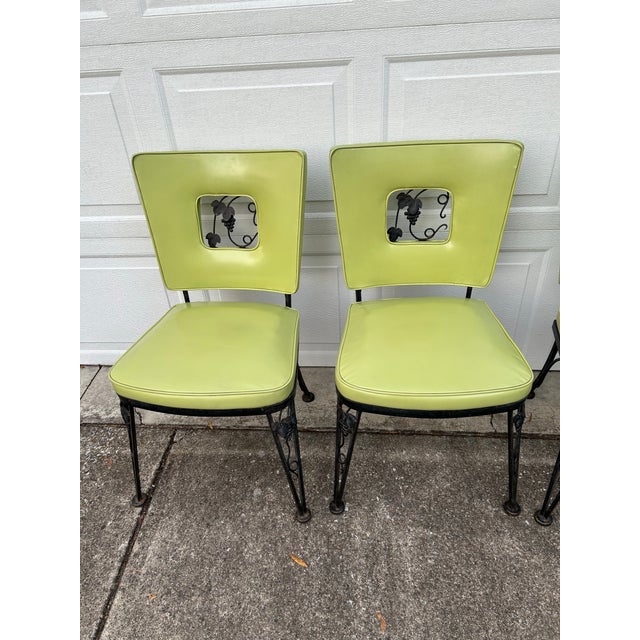 Russell Woodard Black Iron Lime Green Dining/Patio Chairs with grape cluster and leaves is an awesome set of 4 chairs. The...