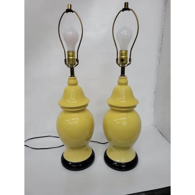 Bring a vibrant pop of color and classic Chinoiserie flair to your space with this striking pair of vintage mid-century...