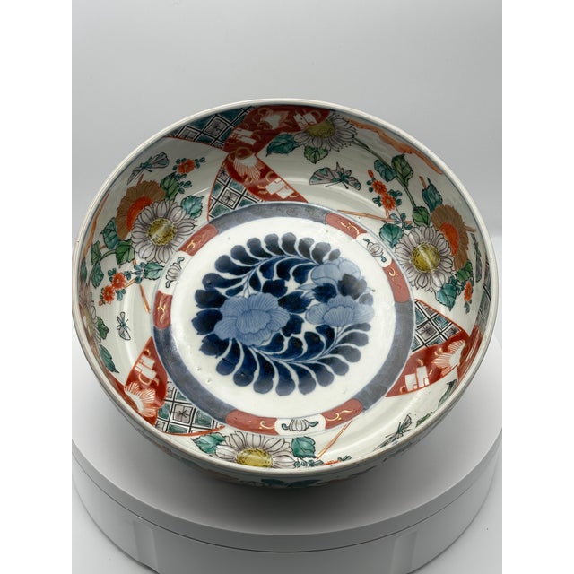 This is a stunning, authentic antique Japanese Imari porcelain bowl, likely dating from the late Meiji Era (c. 1870–1900)....