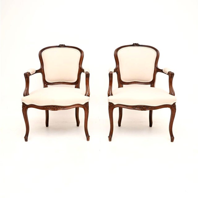 A beautiful pair of antique French walnut salon armchairs, dating from around the 1930’s. The quality is fantastic, the...