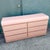 This striking Postmodern waterfall dresser embraces the bold minimalism and playful sophistication that defined late 1980s...