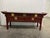 Offered is a solid wood sideboard credenza in the original factory finish. This piece features dovetailed, smooth gliding...