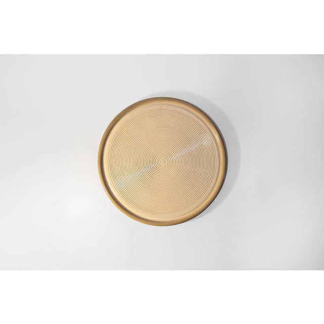 Ceramic plate. Designer Franco Bucci Manufacturer Laboratorio Pesaro 1970s Diameter 36 cm, height 2 cm This piece has an...