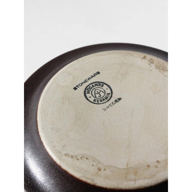 Founded in 1909 in the ceramic-rich region of Swedish Höganäs, Andersson & Johanssons Lergodsfabrik quietly shaped the...