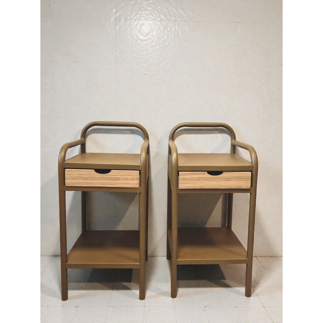 Pair of tubular metal bedside tables, from 20th-century institutional furniture, most likely from a boarding school....
