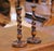 This elegant pair of antique candlesticks was crafted in England circa 1920. Each candle holder stands on a substantial...