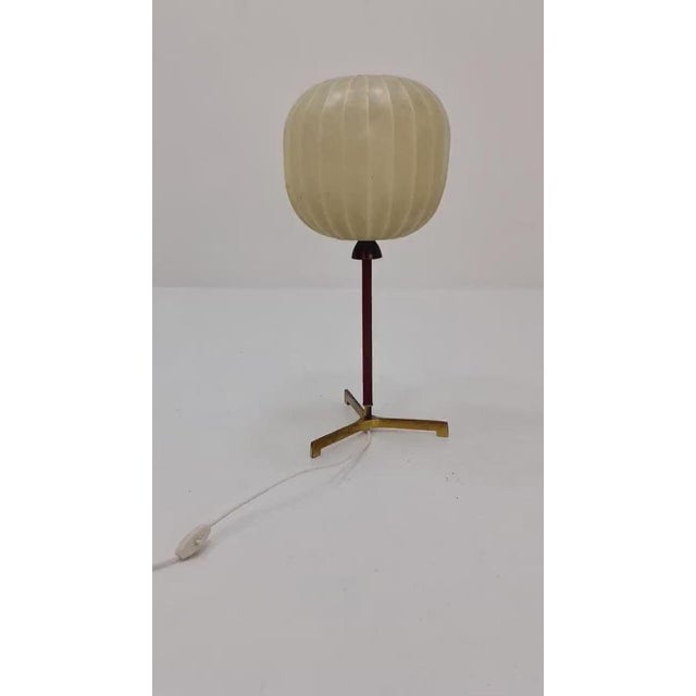 Mid century cocoon teak & brass table lamp by Vereinigte Werkstätten München, Germany, 1960s The lamp and the shade are...