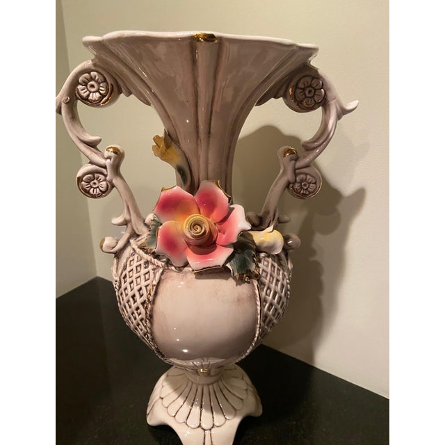 Vintage pair of Capodimonte vases with applied flowers. In perfect condition.