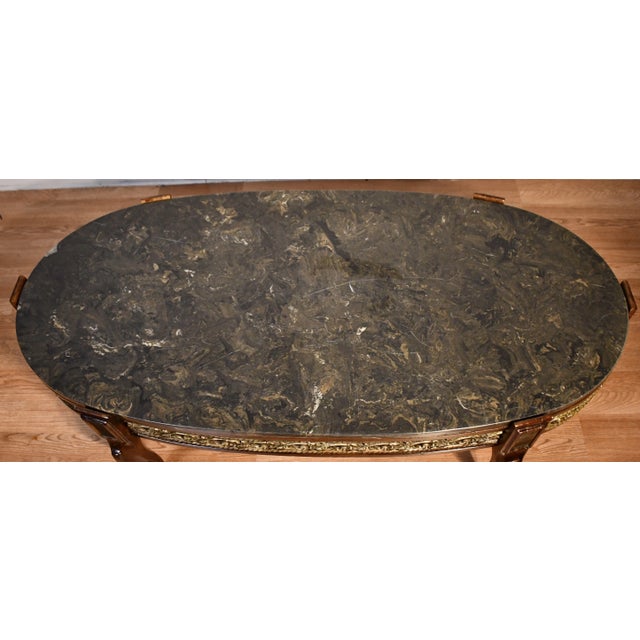 We are pleased to offer this beautiful French Coffee table, from the 1930s. This Table is made of Walnut wood featuring a...