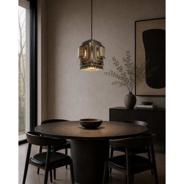 Designed by Danish lighting designer Svend Aage Holm Sørensen and produced in Denmark in the late 1960s, this pendant is...