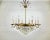 Luxurious Cascading Crystal And Brass Chandelier from France 1960s. Crystal and brass chandelier is the quality in every...