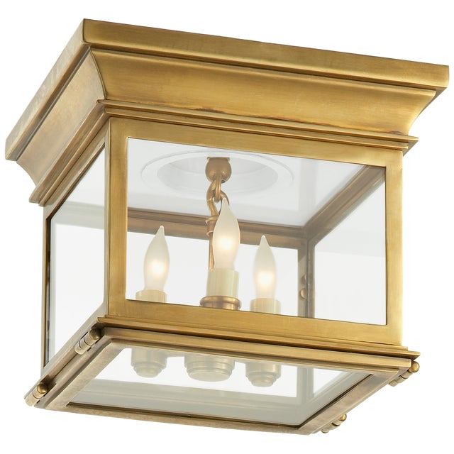 Club Small Square Flush Mount in Antique-Burnished Brass with Clear Glass Designer: Chapman & Myers Mounting: Flush...
