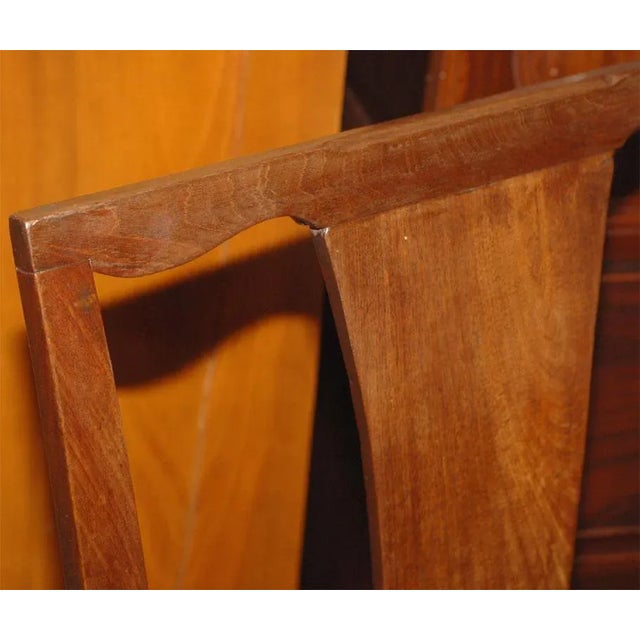 A nice large scaled provincial English mixed woods armchair. Condition: Frame has been tightened and polished. Upholstery...