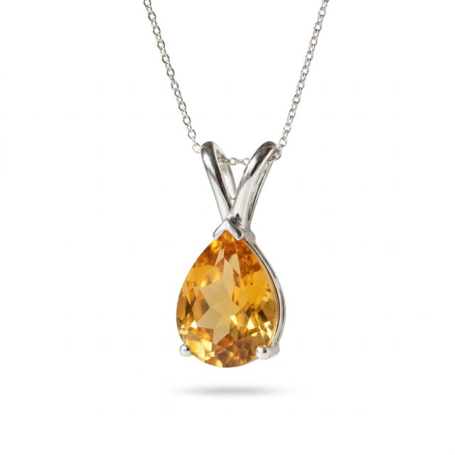 This elegant pendant features a radiant Citrine gemstone, admired for its warm golden glow and vibrant brilliance. Known...
