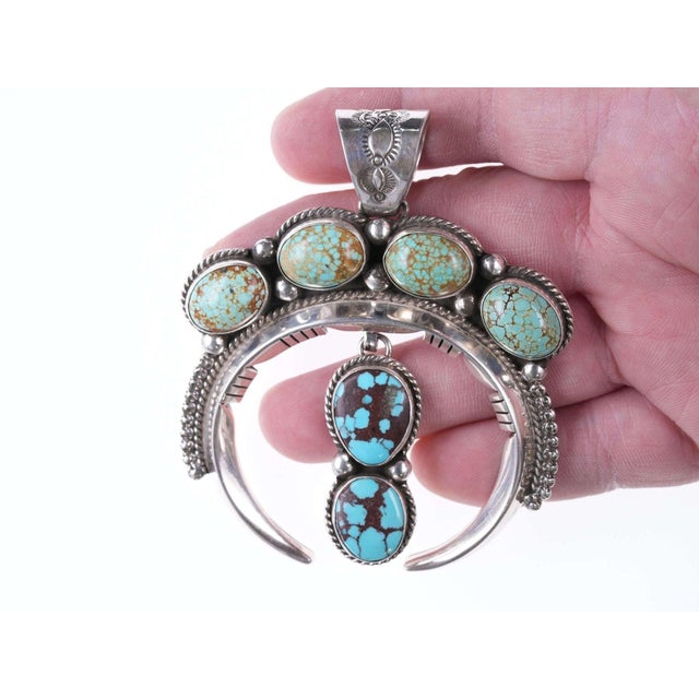 John Nelson Navajo Sterling and ber-Burnham turquoise pendant 3.5" tall x 3" wide x 84.6 grams with no issues. John Nelson...