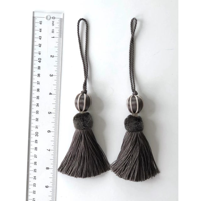 Petite Pair of Ash Gray and Stone Colored Beaded Key Tassels. These muted smoky ash and light stone colored tassels are a...