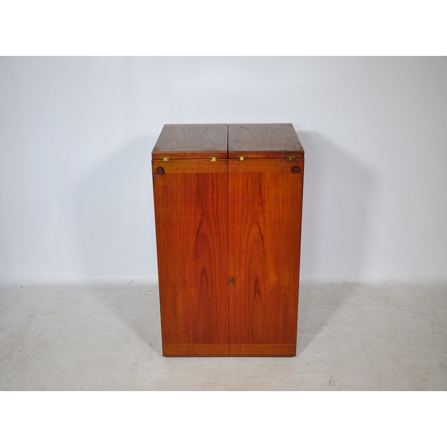 Rare folding Captain's Bar cabinet by Reno Wahl Iversen for Skovby from the 1960s. This teak cabinet opens fully,...