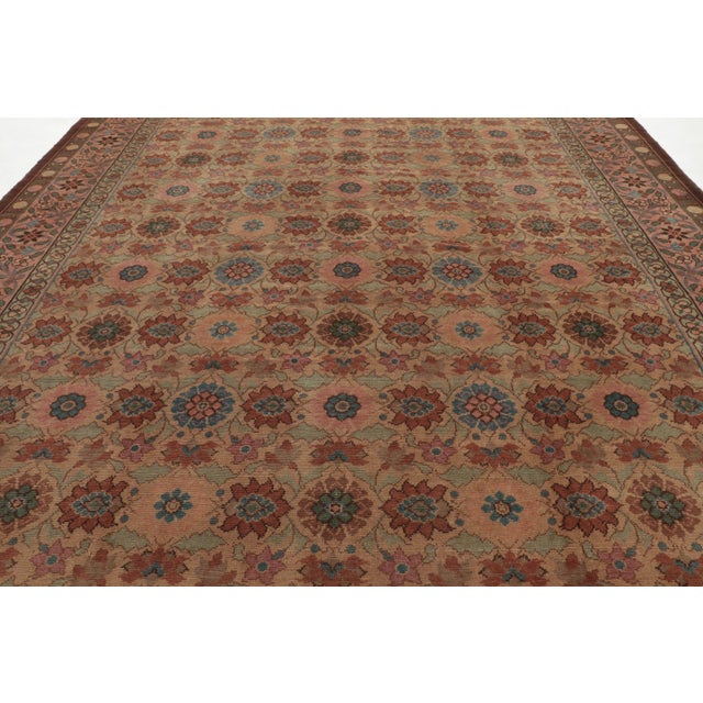 This 12x16 oversized antique English Needlepoint rug is a spectacular addition to Rug & Kilim’s European collection; a...