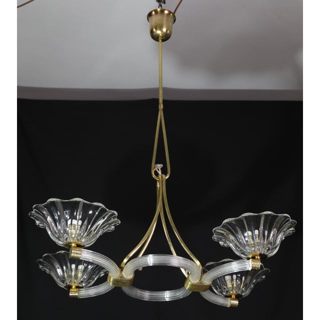 Museale 4-light Murano chandelier, made by Barovier and Toso glassworks. Production period: 1950s. The body consists of 4...
