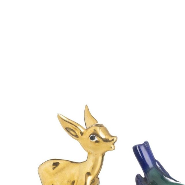Porcelain - Set of four pieces. 20th-century porcelain, comprising: a gazelle from the Lusitânia factory and three birds,...