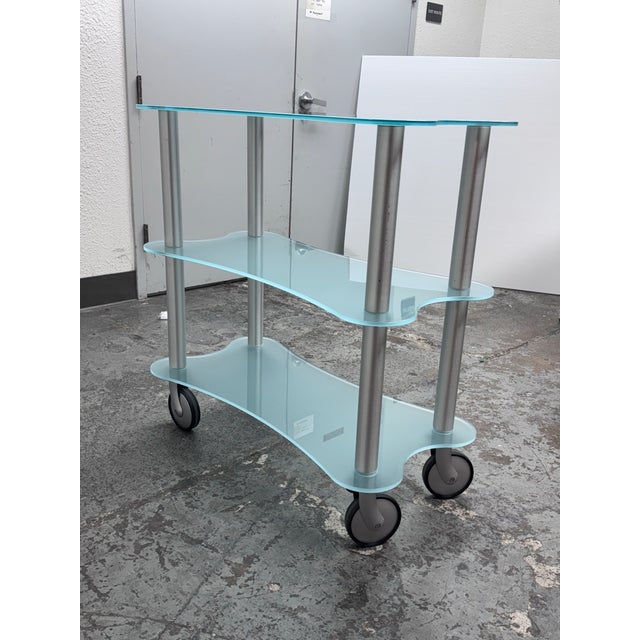Design Plus Gallery presents a Glass Shelving Cart by Gallotti & Radice from the Late 20th Century. A completely...