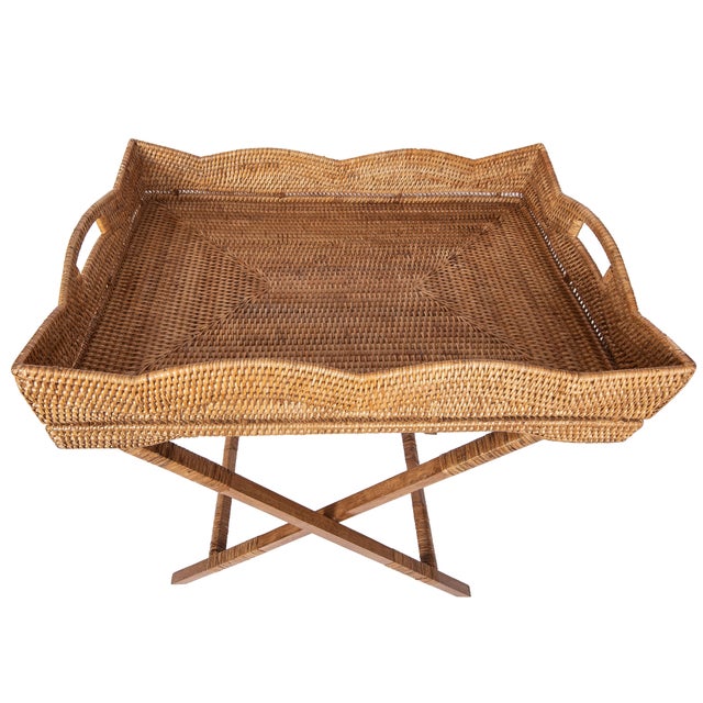 Infuse your home with the perfect blend of style and functionality with the Scallop Design Butler Tray with Wooden Legs....