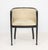 Art Deco Black Lacquered Tub Chair, 1920s, probably Belgian, with beige upholstery. 29" H x 23" W x 21" D. Provenance:...