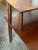 Large 2 tier corner table in a warm cherry finish, blending form and function with its clean mid century lines, circa...