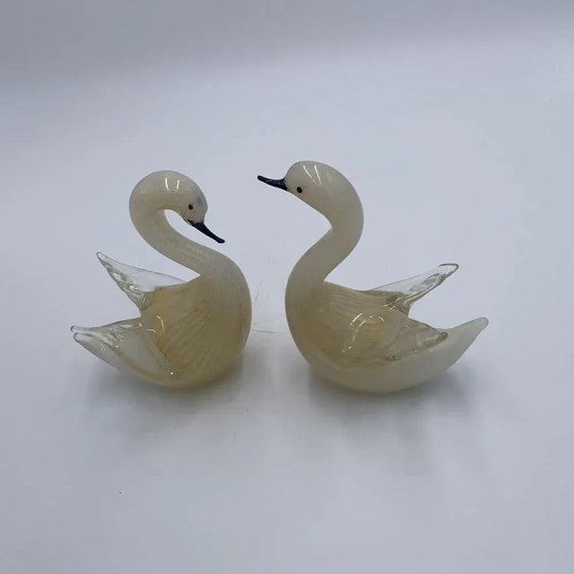 Pair of glass swans head up and head down opaline gold cm.20 head up - cm. 18 head down cm.15 head up - cm.10 head down...