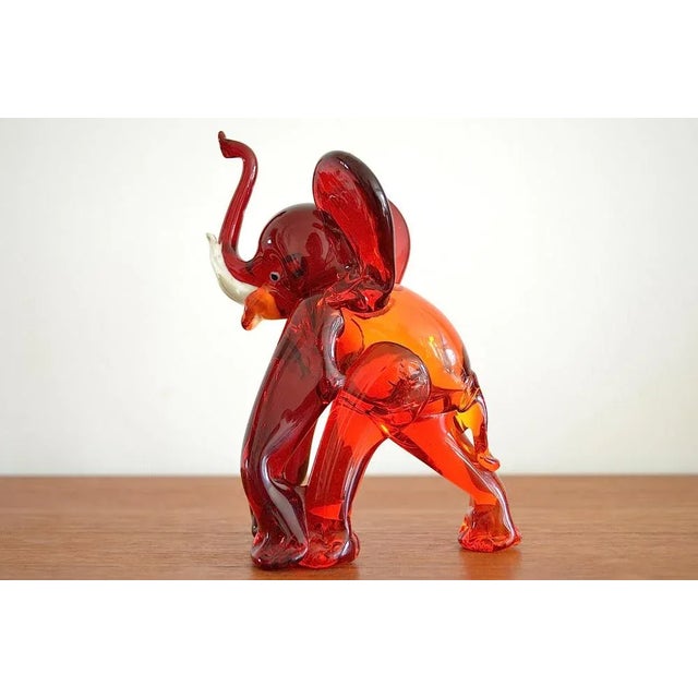 Mid-Century Muranoglas Elefant probably from Ercole Barovier for Barovier & Toso Italy. The elephant is white from a red...