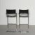 Pair of Italian chrome and black belt leather cantilevered bar stools in the style of Mart Stam. In wonderful vintage...